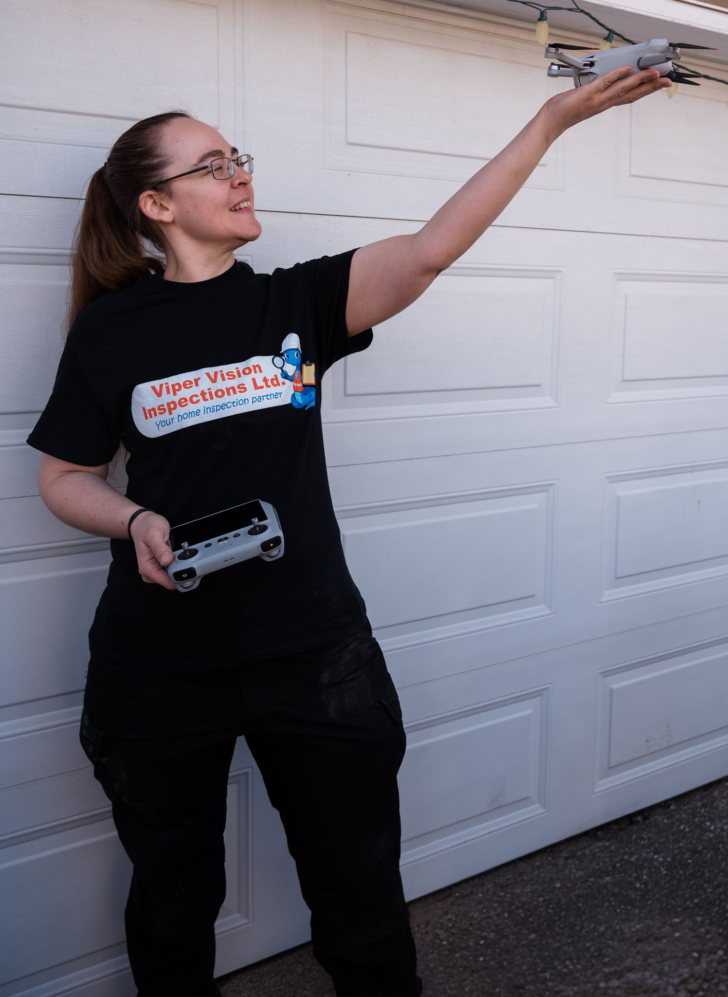 Home inspector posing with a drone